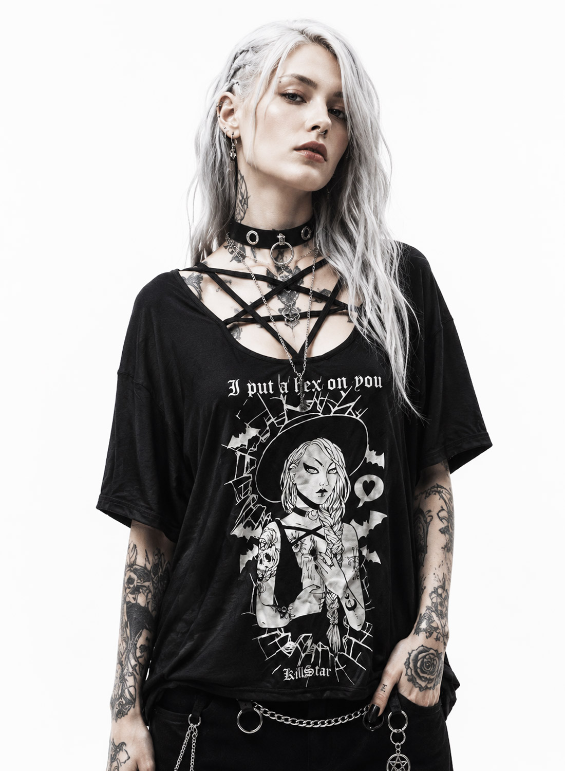 Hex Pentagram Top. Black oversized top with "I put a hex on you" print, crossed straps in the neckline and goth-inspired motif.