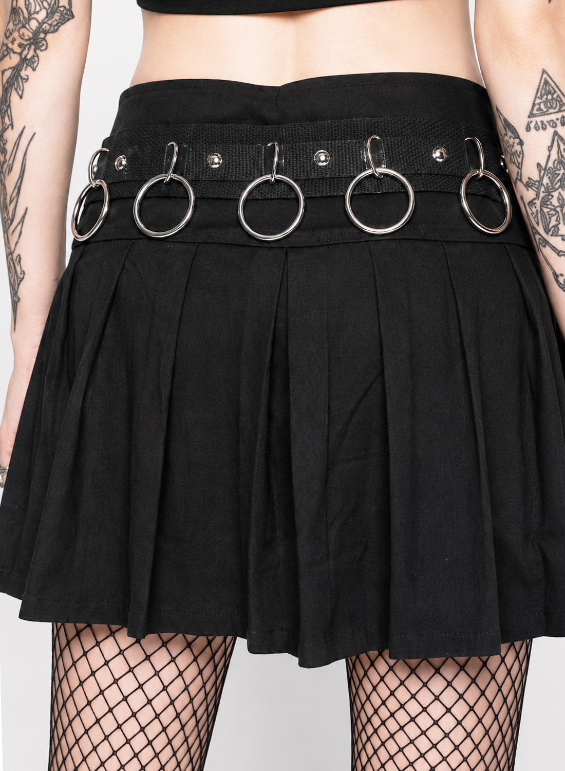 Black pleated gothic mini skirt with chains, O-rings, zipper and silver pentagram detail.