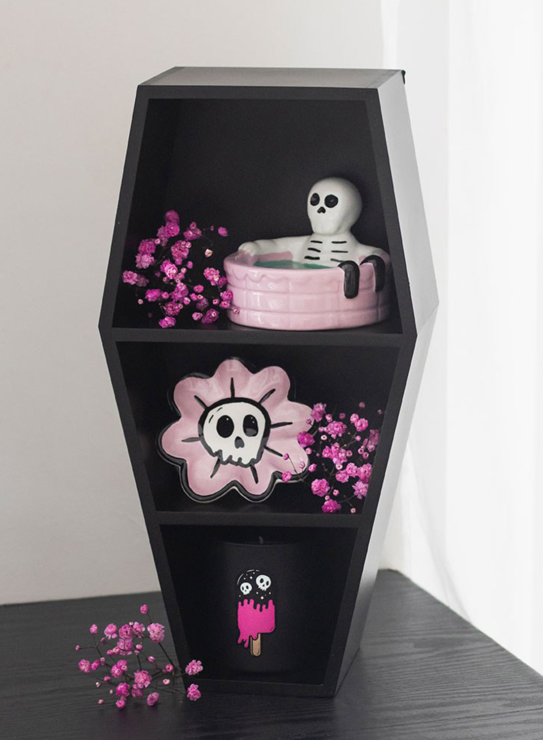 Coffin of Darkness. Black Gothic coffin-shaped shelf, 40 cm high, for crystals, plants and decorative objects. Gothic decor from Something Different.