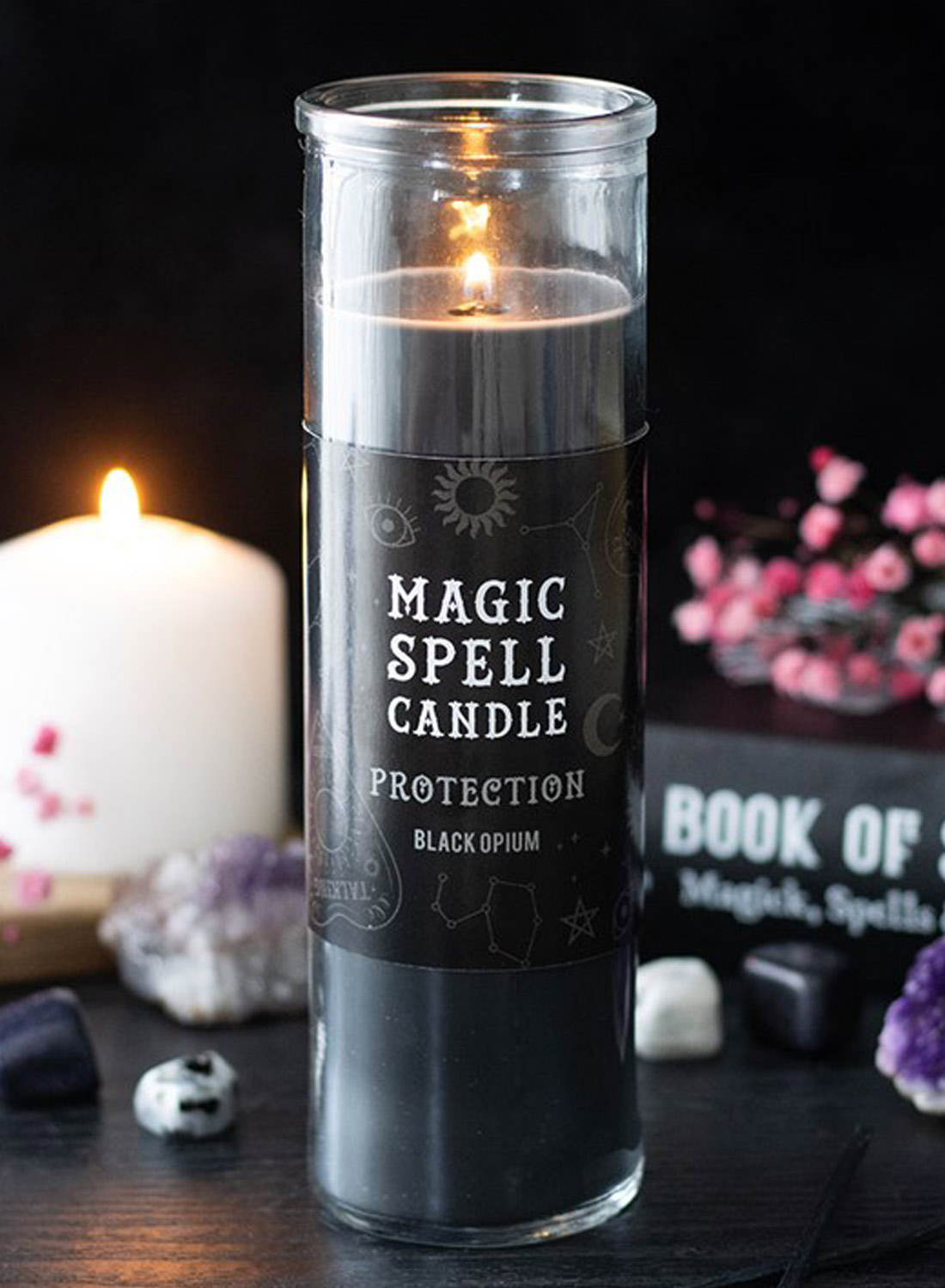 Magic Spell Candle Opium - black glass scented candle with Protection label, magical symbols and a burn time of up to approximately 70 hours.