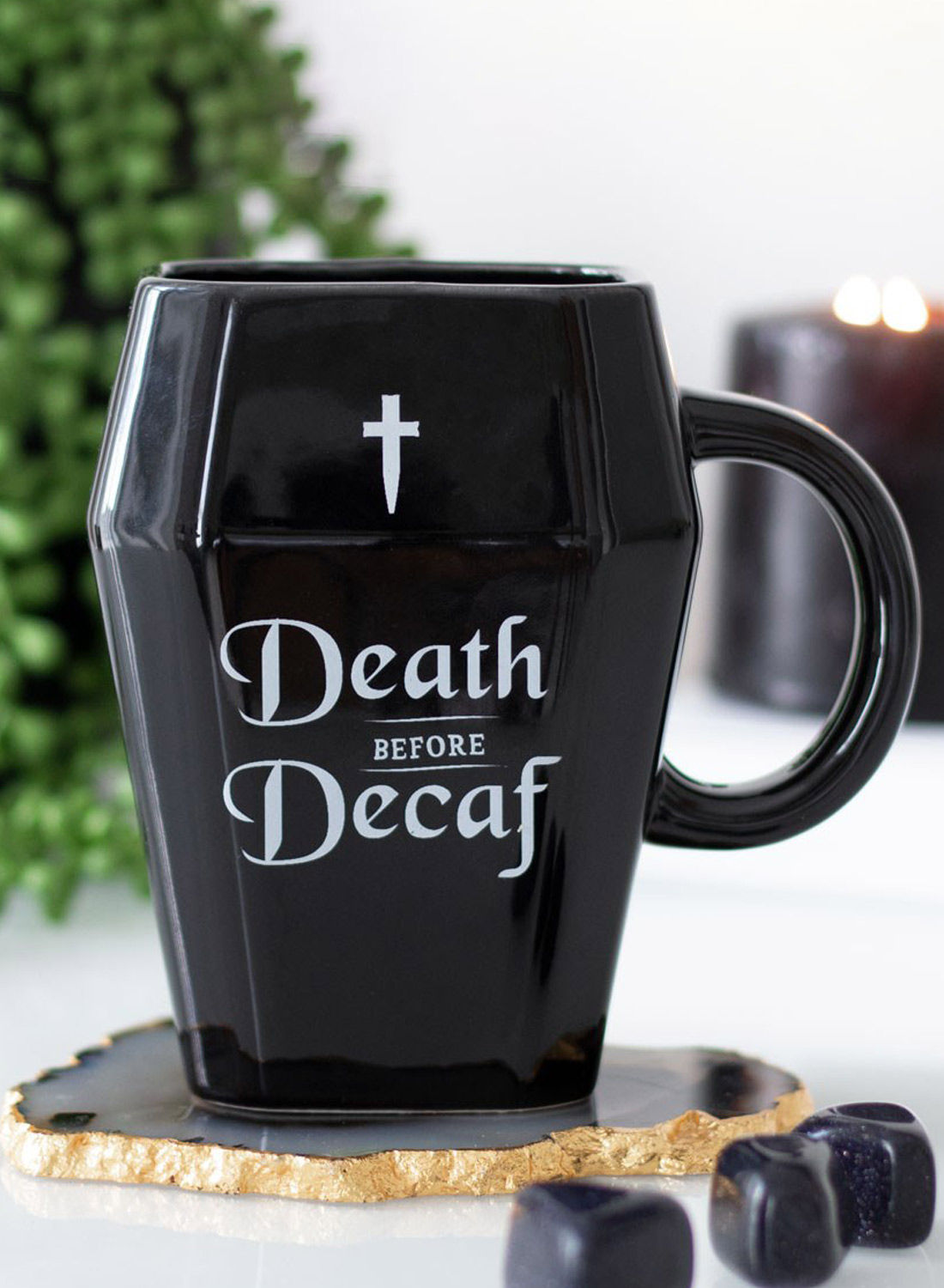 Death Before Decaf Coffin Mug - black glossy coffee mug shaped like a coffin with a white cross, Death Before Decaf print and large handle.