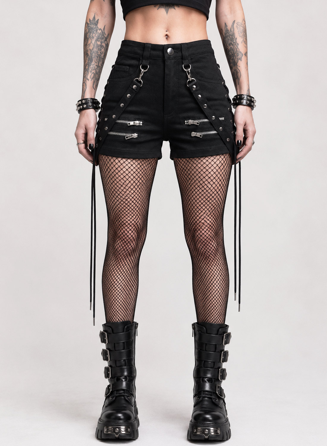 Black Bad Omens Shorts in stretch fabric with silver zippers, removable rivet straps and decorative lacing along the sides.
